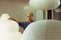 Isamu Noguchi with Akari lights sculptures, 1968.