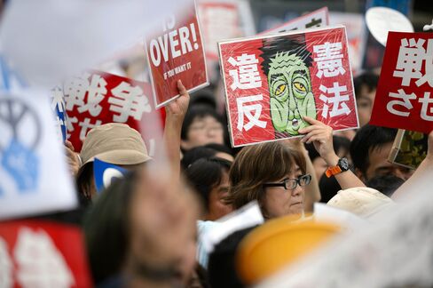 People Take Part In Protest Against Japanese Prime Minister Shinzo Abe's Security Bills