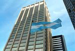 The Argentine flag flies in front of the Buenos Aires building