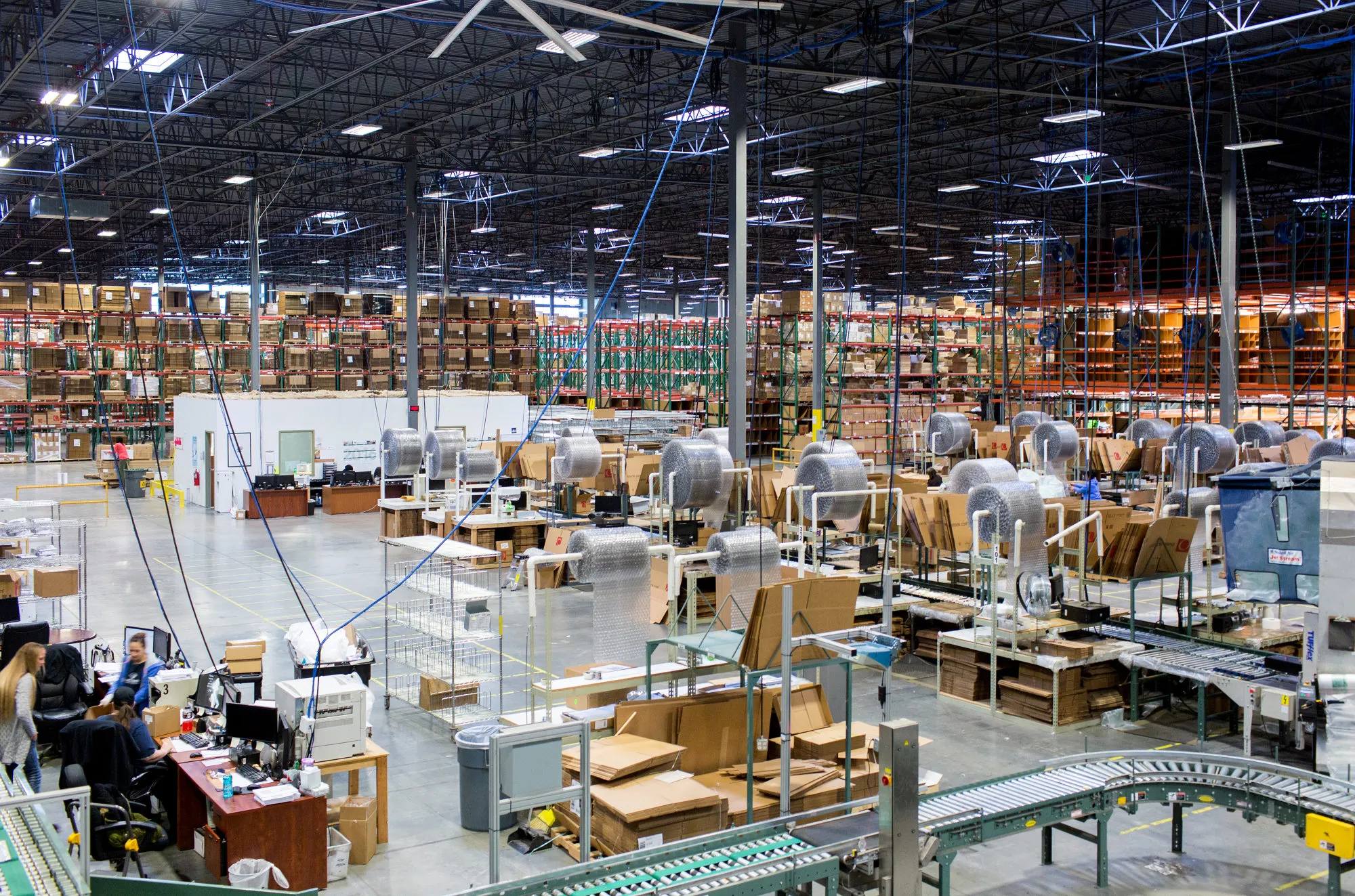 Employees work at the Overstock.com Inc. fulfillment center in Salt Lake City, Utah, on&nbsp;April 26, 2016.