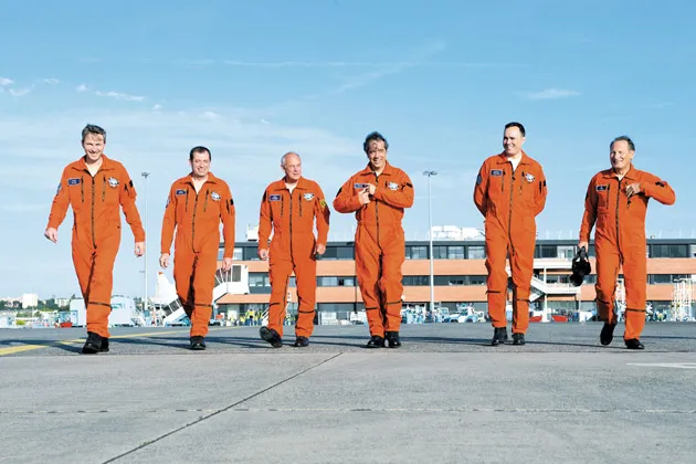 Du Ché, far left, with his team on the tarmac in Toulouse