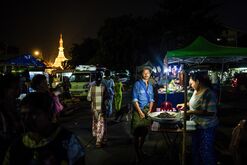 A stall vendor during a blackout in Yangon in April.