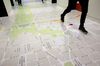 A Google Inc. Maps display of Washington D.C. lines the floor next to the elevators at the Google office in Washington, D.C., U.S., on Tuesday, July 15, 2014.