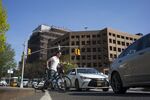 A bicyclist tries to cross traffic on an Atlantic Avenue entrance ramp to the Brooklyn-Queens Expressway in Brooklyn. 