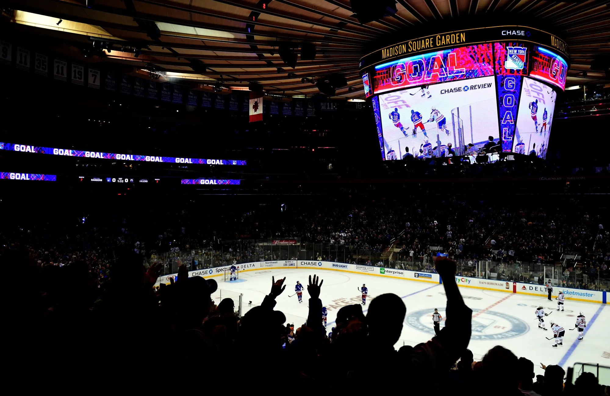 Fans celebrate a goal by the New York Rangers at Madison Square Garden.