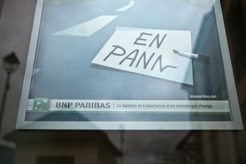 A BNP Paribas Poster Sits in Jouars-Pontchartrain