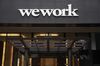 Signage is displayed on a WeWork co-working space, operated by parent company We Co., in downtown San Diego, California, U.S., on Thursday, May 7, 2020. .