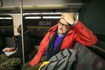Philippe Boucher&nbsp;rides a public-transit bus on Feb. 10, 2015, on the&nbsp;way to work as a French translator at a company that contracts services to Microsoft. He’s part of a movement of temporary workers trying to gain better benefits and working conditions.