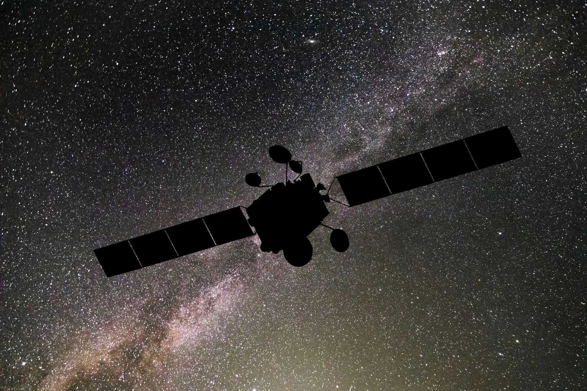 Communications satellite on the background of the starry sky. Satellite connection