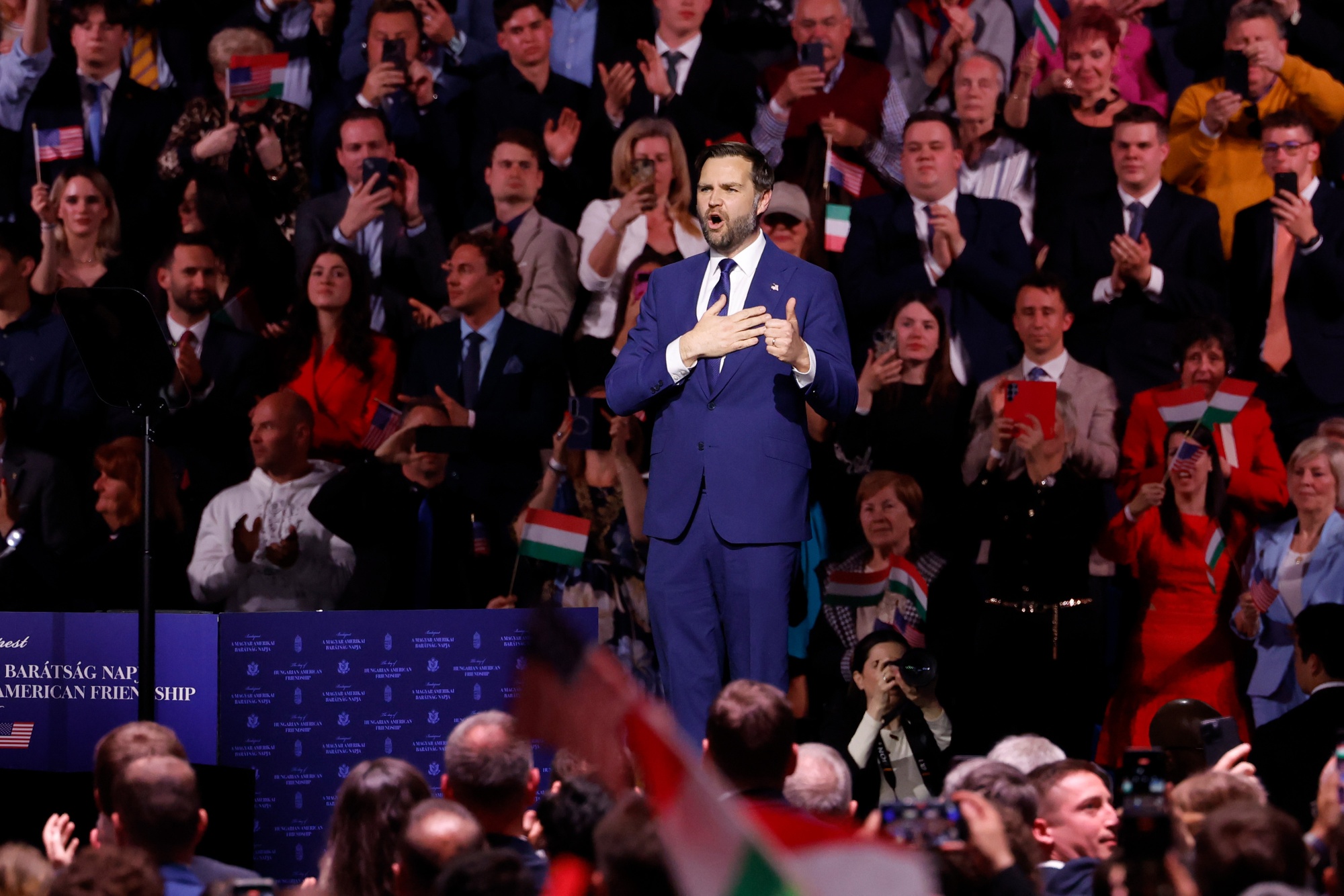 US Vice President JD Vance speaks at a pre-election rally for Viktor Orban, Hungary's prime minister, in Budapest, Hungary, on Tuesday, April 7, 2026. With five days until elections in Hungary, Orban is hoping that the visit of US Vice President JD Vance to Budapest can turn things around. Photographer: Akos Stiller/Bloomberg