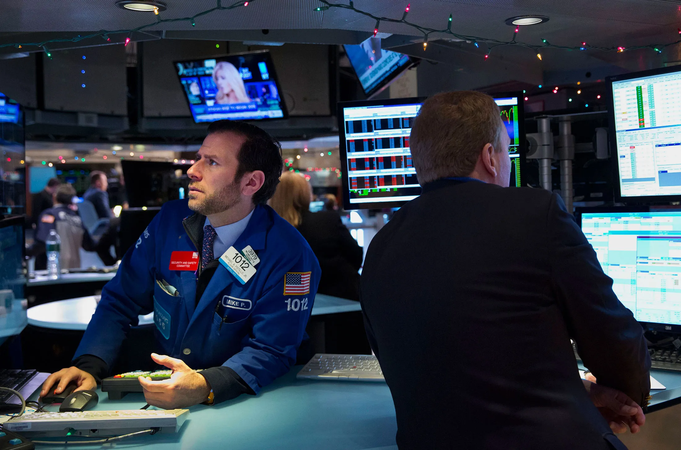 Traders work on the floor of the New York Stock Exchange
