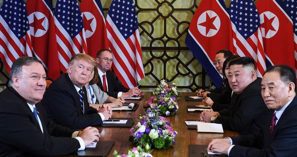 Trump and Kim Jong Un, center left and right, hold a bilateral meeting in Hanoi on Feb. 28, 2019.