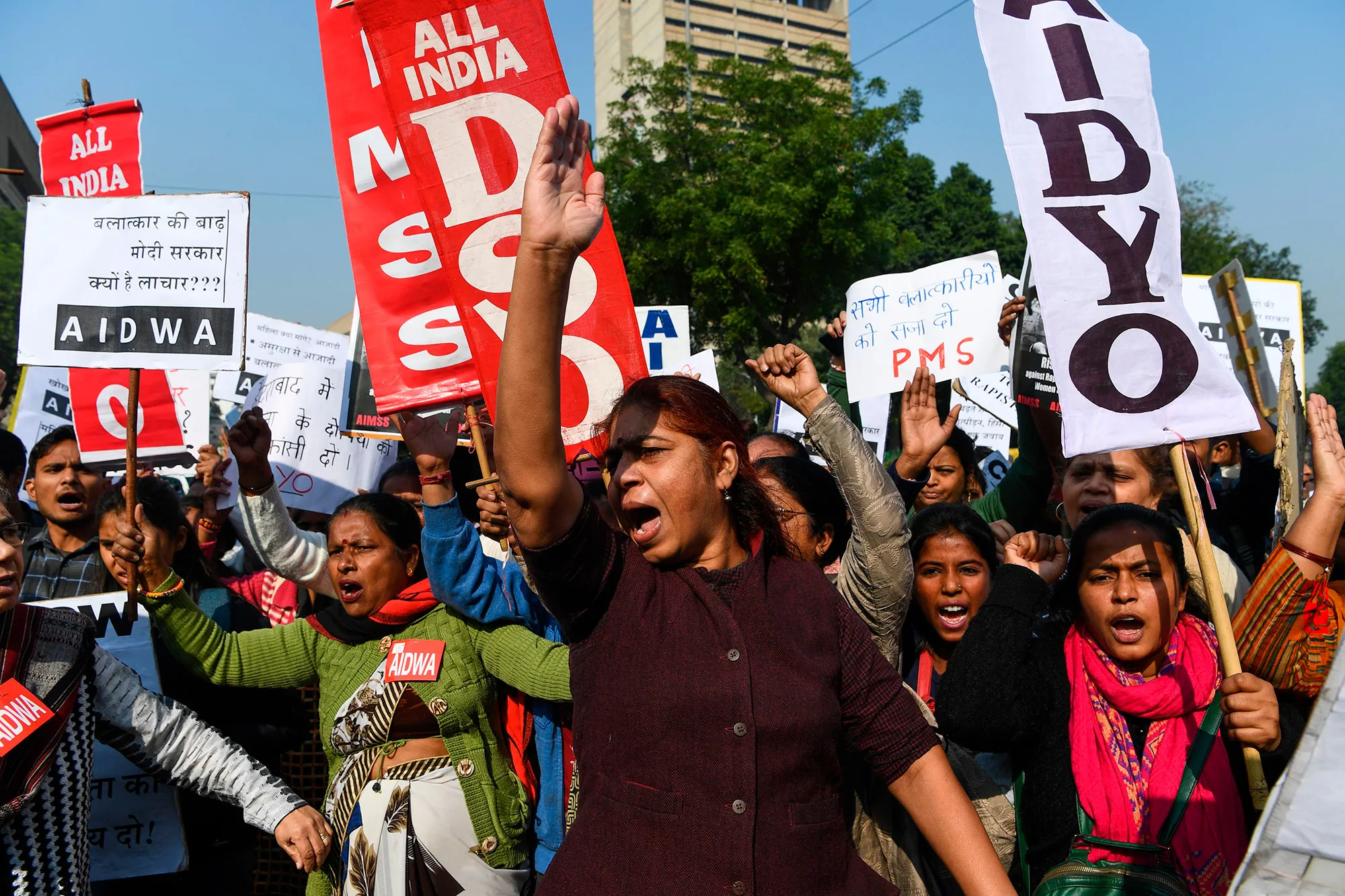 Demonstrators shout slogans to protest against the alleged rape and murder in New Delhi, Dec. 2.