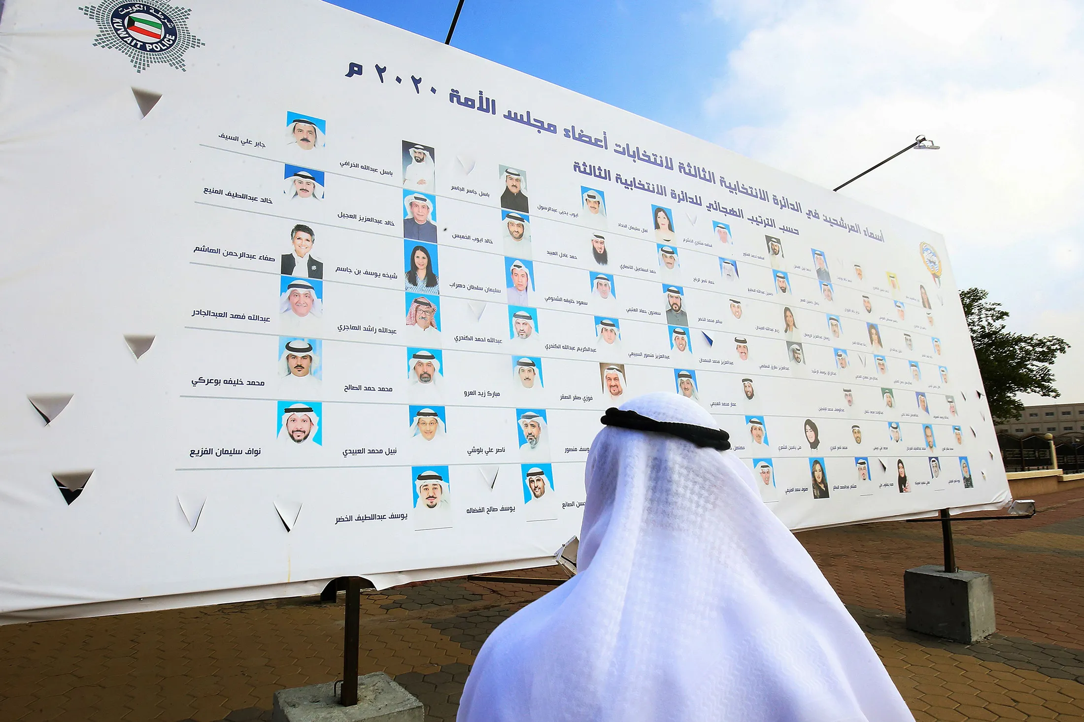 A billboard featuring the candidates running for parliamentary elections in Kuwait City&nbsp;on Nov. 30.
