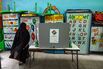 A voter goes to cast her ballot at a polling station in Delhi, India, in May.
