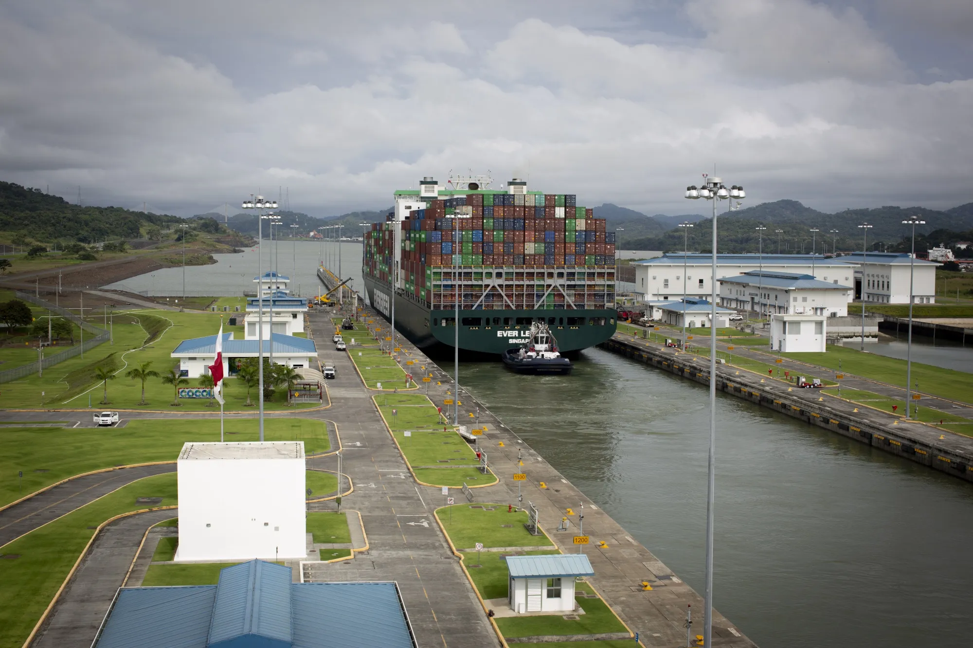 A cargo vessel travels through the Panama Canal.