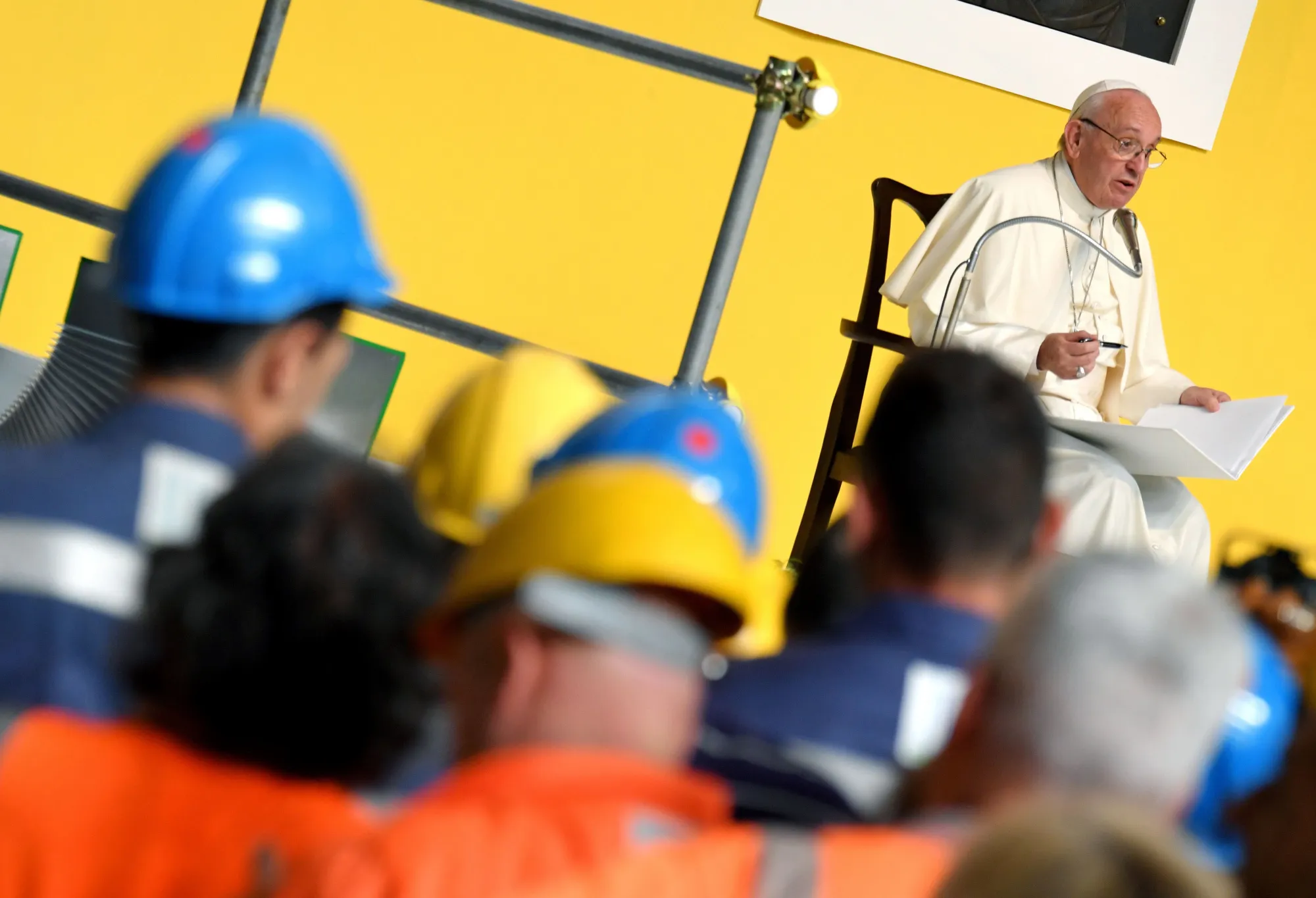 Pope Francis addresses workers at the Ilva steel plant in Genoa, Italy, on May 27.

