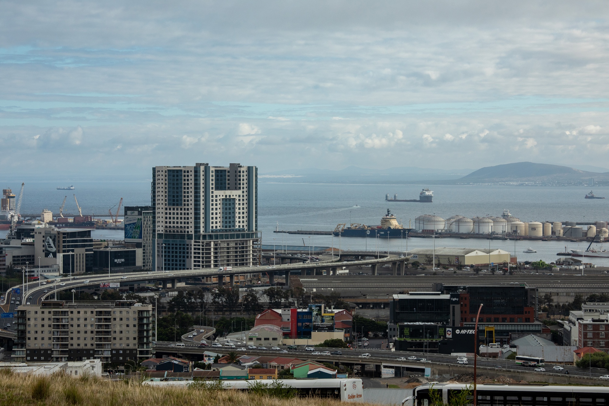 Storage tanks, right, at the Port of Cape Town in Cape Town, South Africa, on Wednesday, Feb. 25, 2026. South Africa’s latest budget painted an encouraging picture of improving public finances, according to Moody’s Ratings, while cautioning that “meaningful” debt reduction will require stronger economic growth.