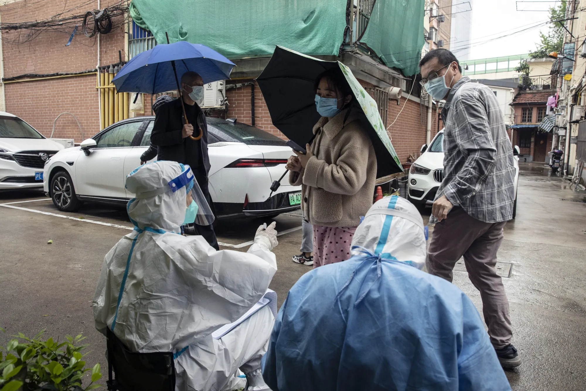 Residents take part in a round of Covid-19 testing during a lockdown in Shanghai, China, on&nbsp;April 14.