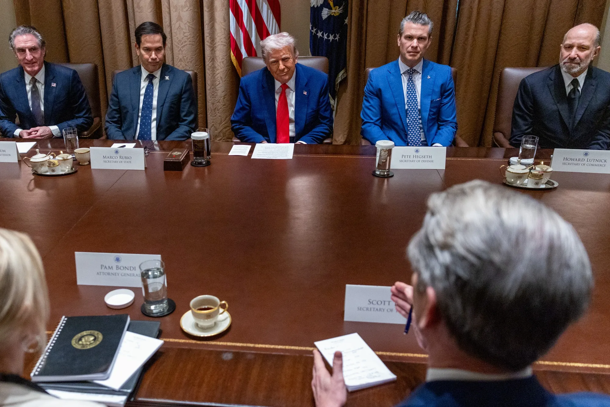 US President Donald Trump, center, watches as Scott Bessent, US Treasury secretary, lower right, speaks during a cabinet meeting at the White House in Washington, DC.