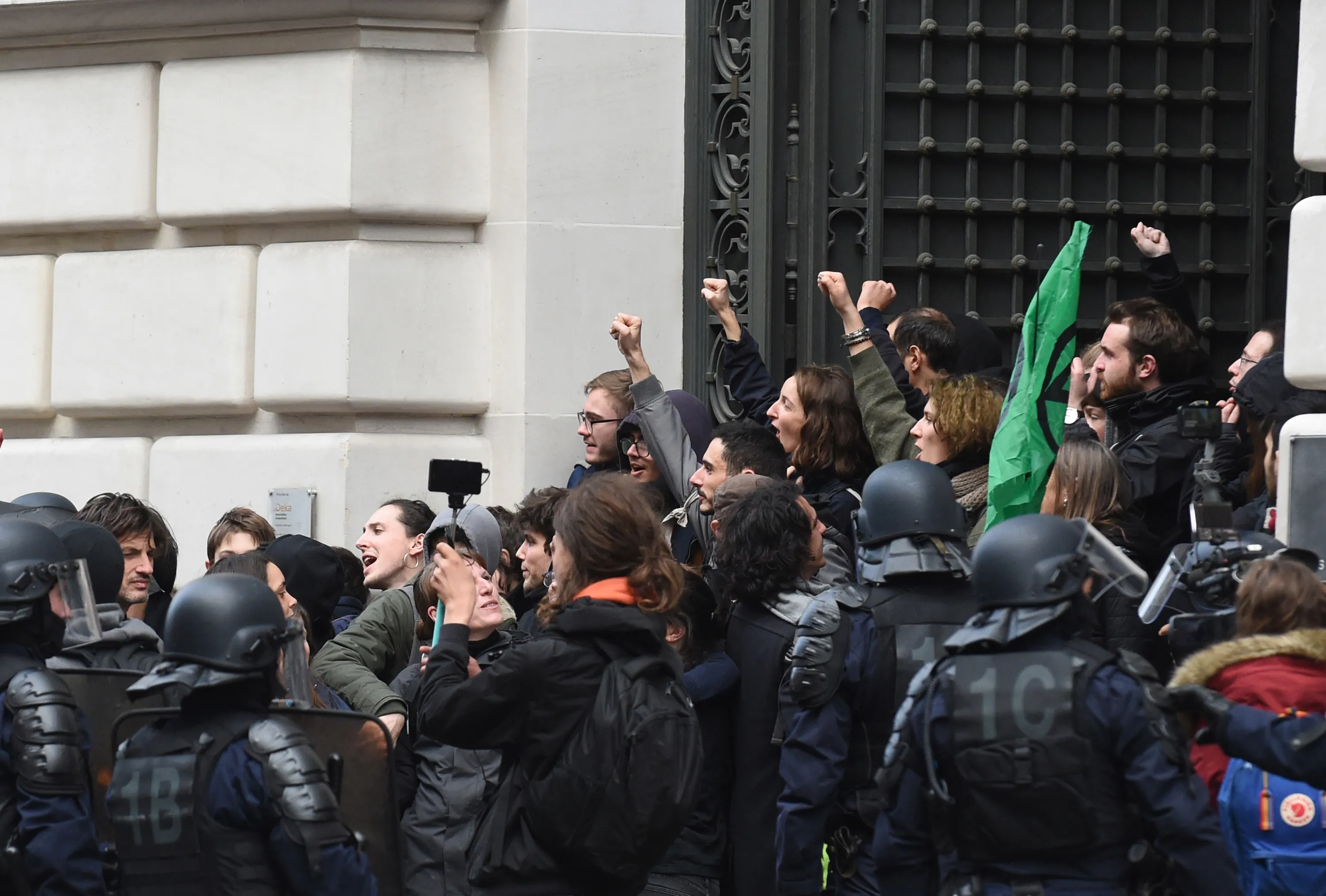 Activists&nbsp;stage a protest at&nbsp;BlackRock’s office in Paris on Feb. 10.