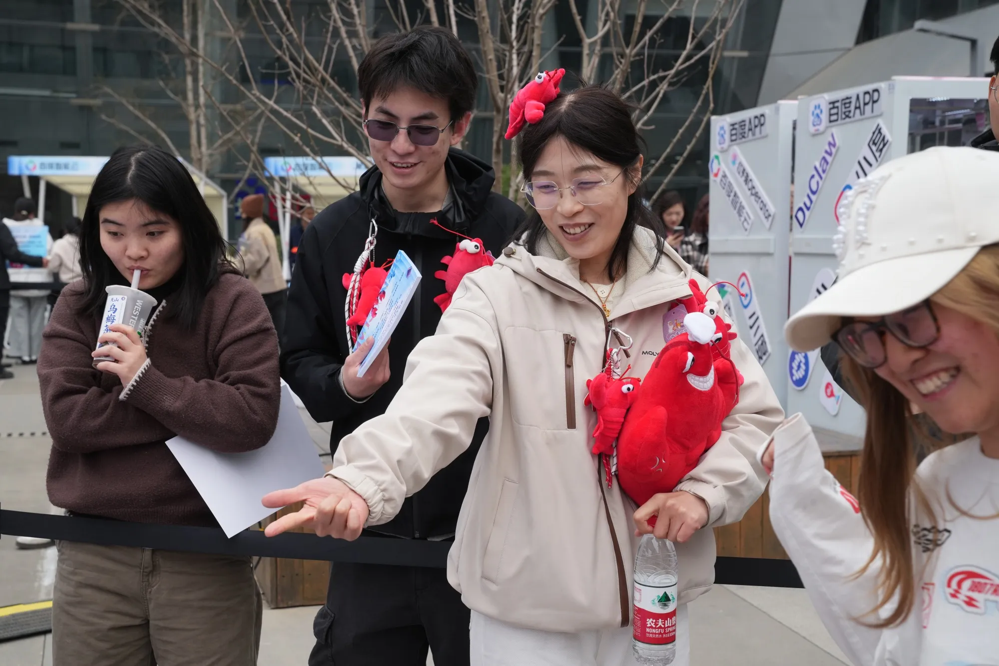 Attendees play games at Baidu’s OpenClaw Lobster Market event in Beijing in March.