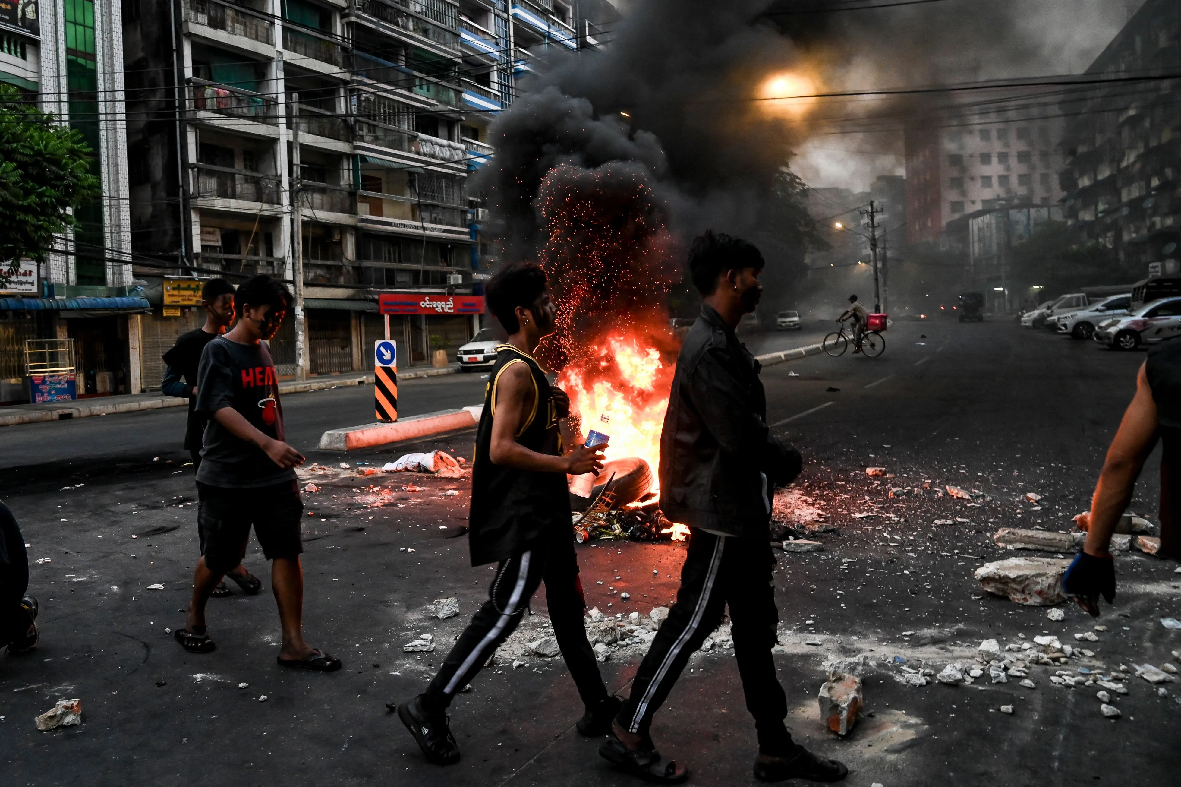 A burning barricade during a protest against the military coup, in Yangon on March 30.