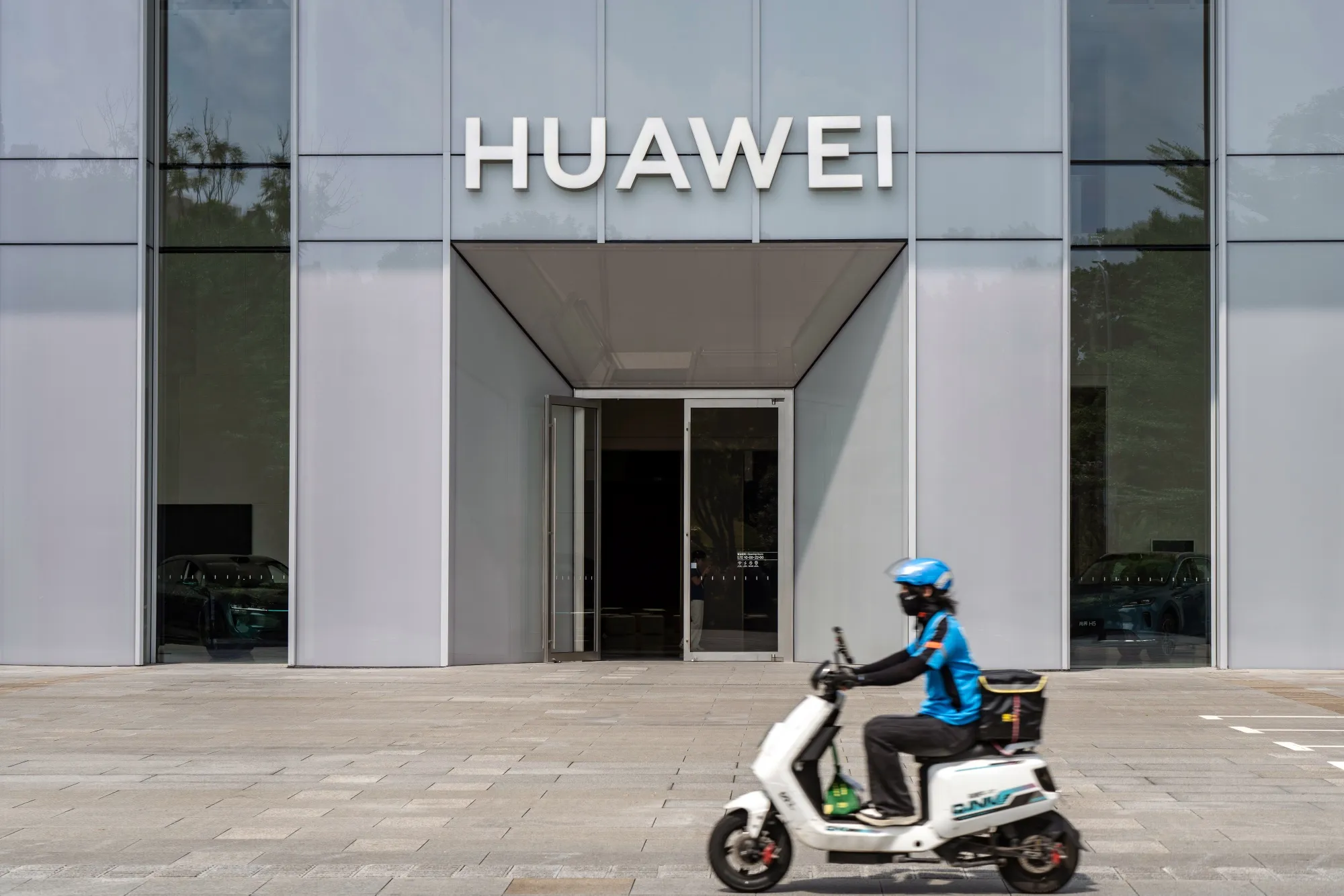A Huawei Technologies Co. flagship store in Shenzhen, China, on Wednesday, Oct. 8, 2025. Huawei is preparing to sharply ramp up production of its most advanced artificial intelligence chips over the next year, aiming to win customers in the world’s biggest semiconductor market while Nvidia Corp. struggles with geopolitical headwinds.