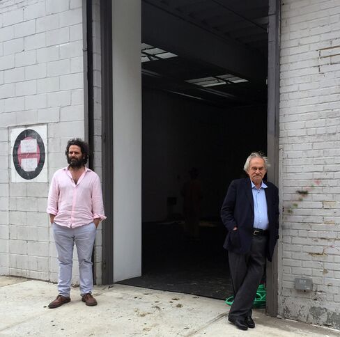 Gallery owner Gavin Brown and artist Jannis Kounellis outside the NYC installation of Untitled (12 Horses).