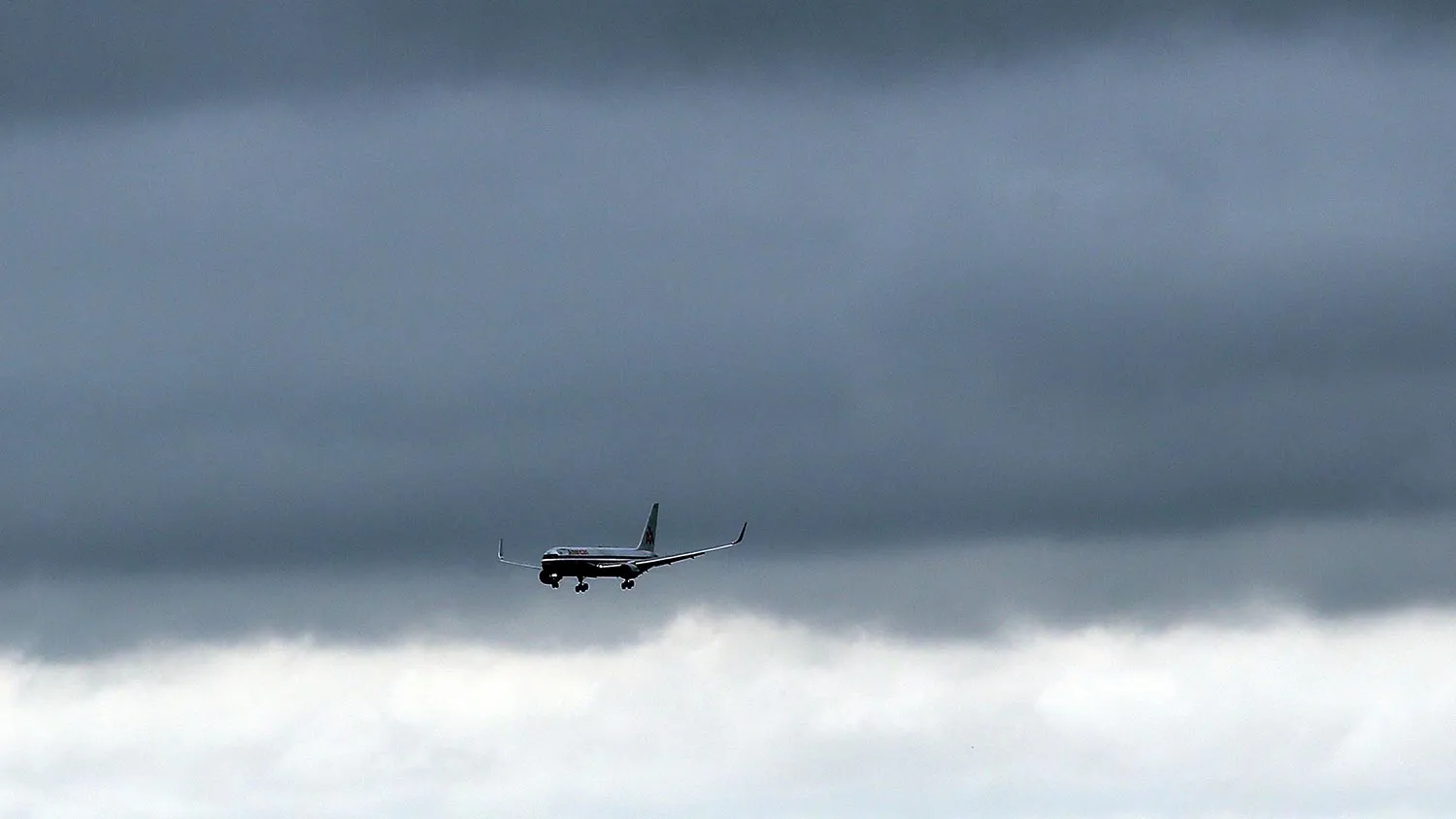 A plane arrives at New York's John F. Kennedy Airport (JFK ) airport on October 11, 2014 in New York City. Ebola screenings began on Saturday at JFK for travelers arriving from West African countries that have been afftected by the disease.
