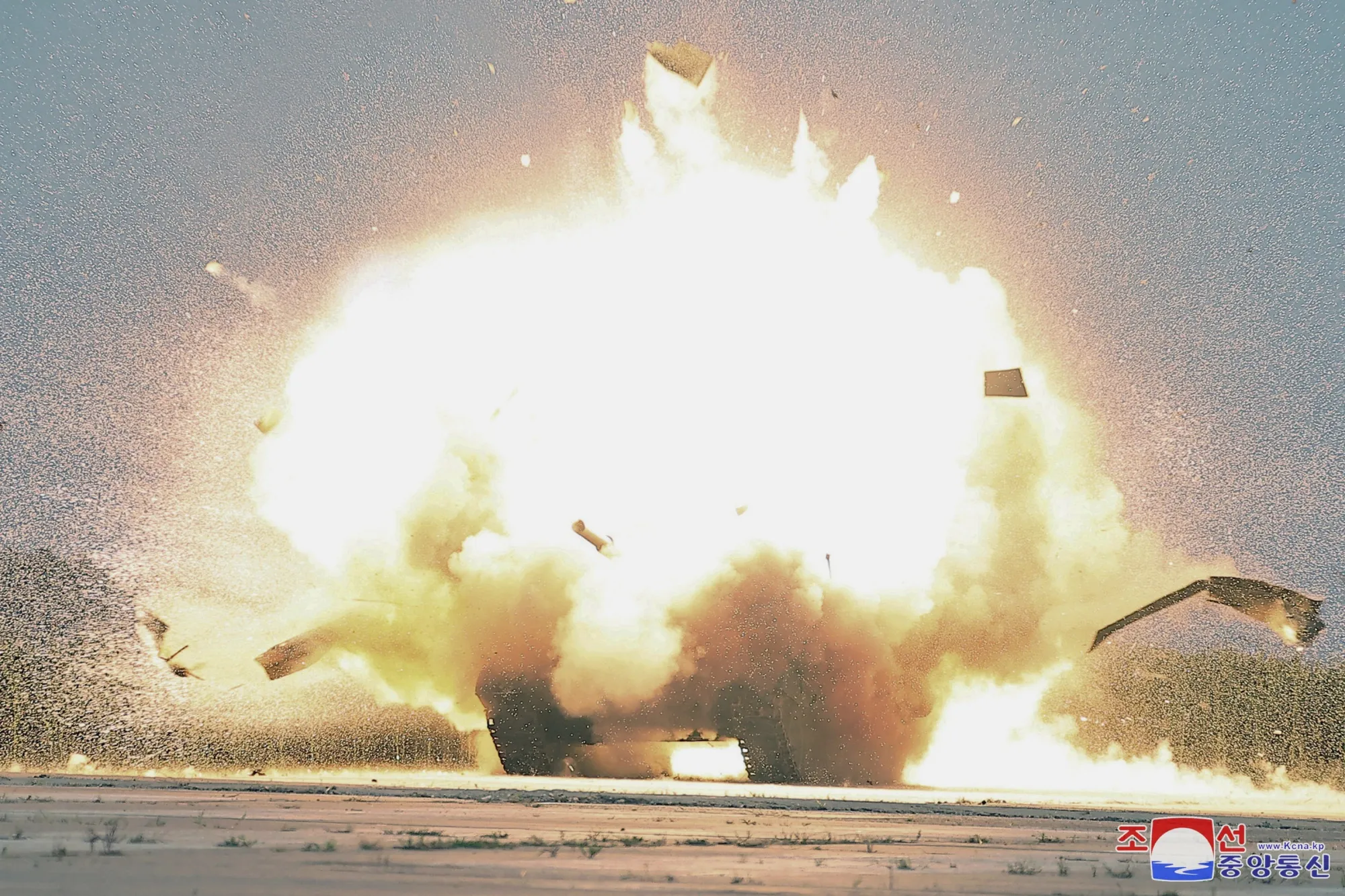 This photo provided by the North Korean government shows a tank destroyed by a drone during a target demonstration on Aug. 24.