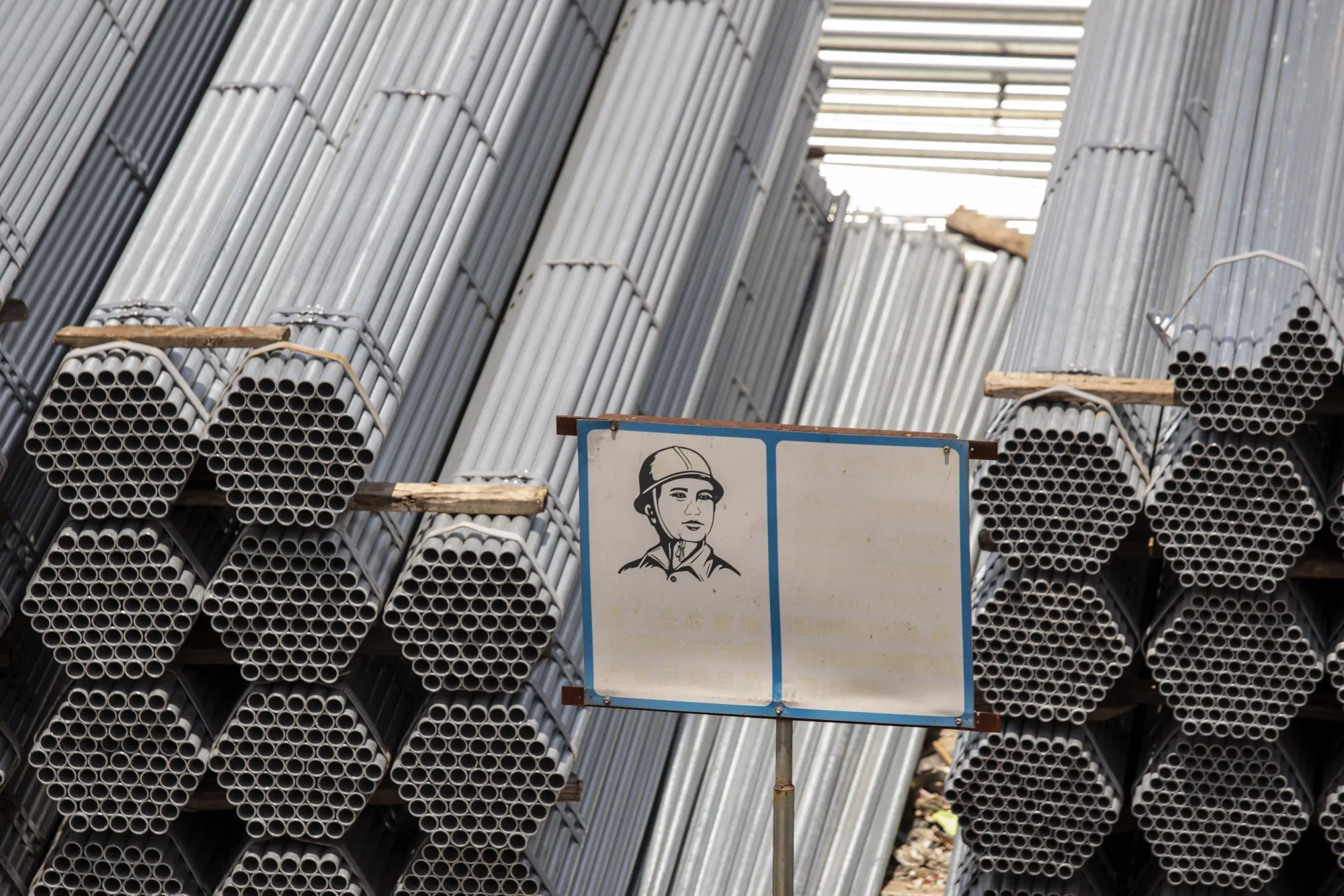 Bundles of steel tubes at a metal stock yard in Shanghai, China.