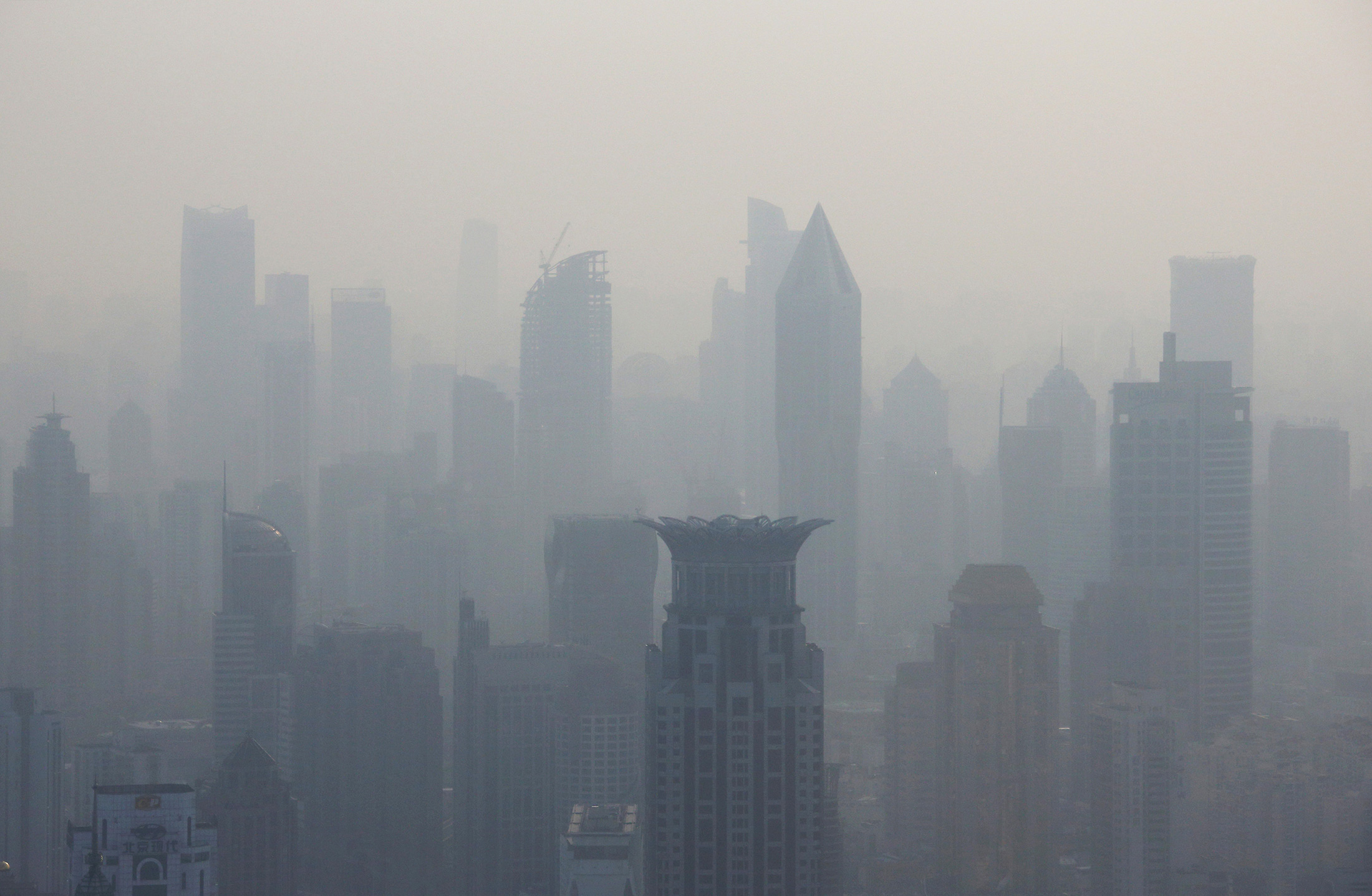 Commercial and residential buildings stand shrouded in haze in Shanghai, China, on April 18.

