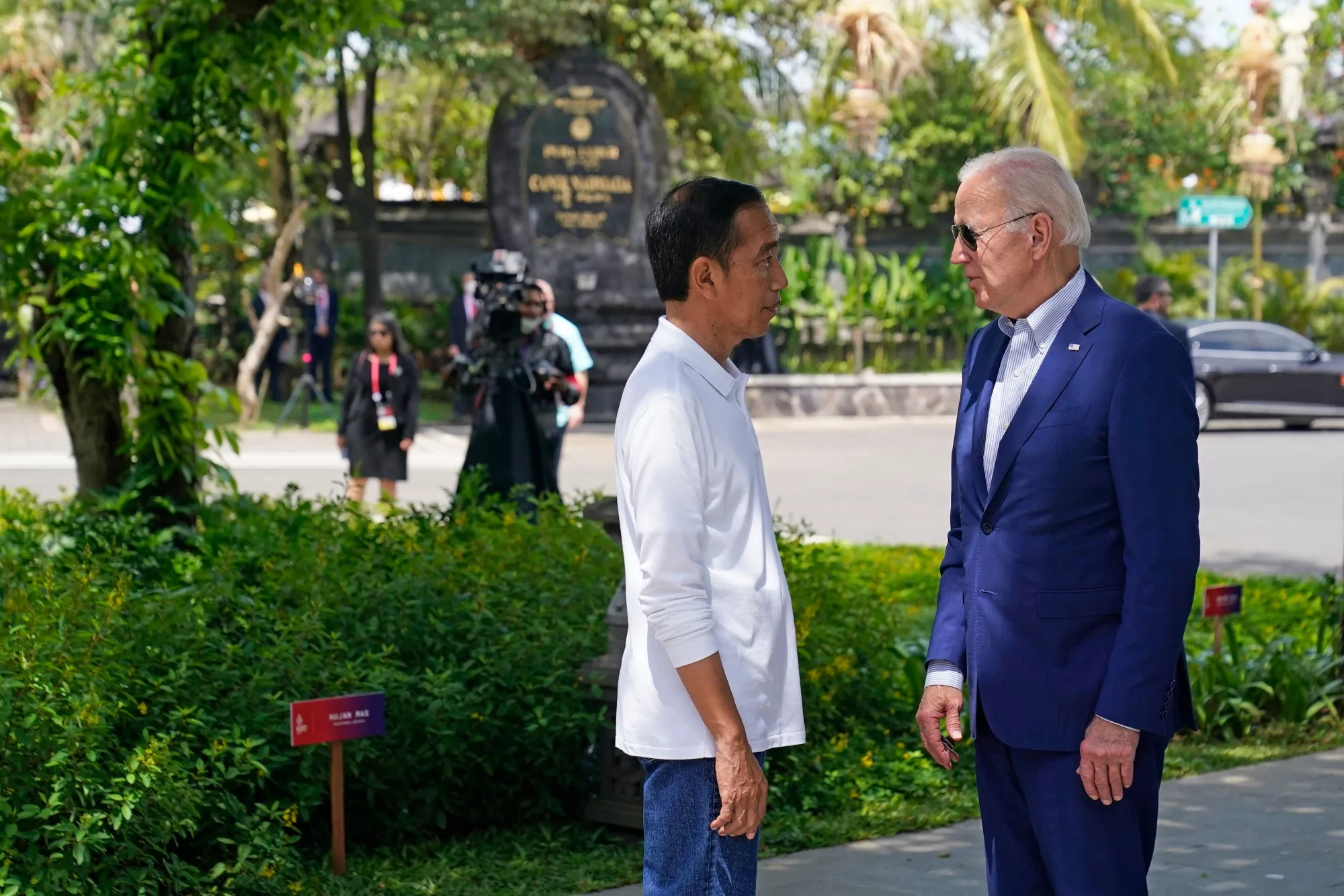 Joe Biden with&nbsp;Joko Widodo at&nbsp;a tree planting event at the Taman Hutan Raya Ngurah Rai Mangrove Forest, on Nov. 16.&nbsp;