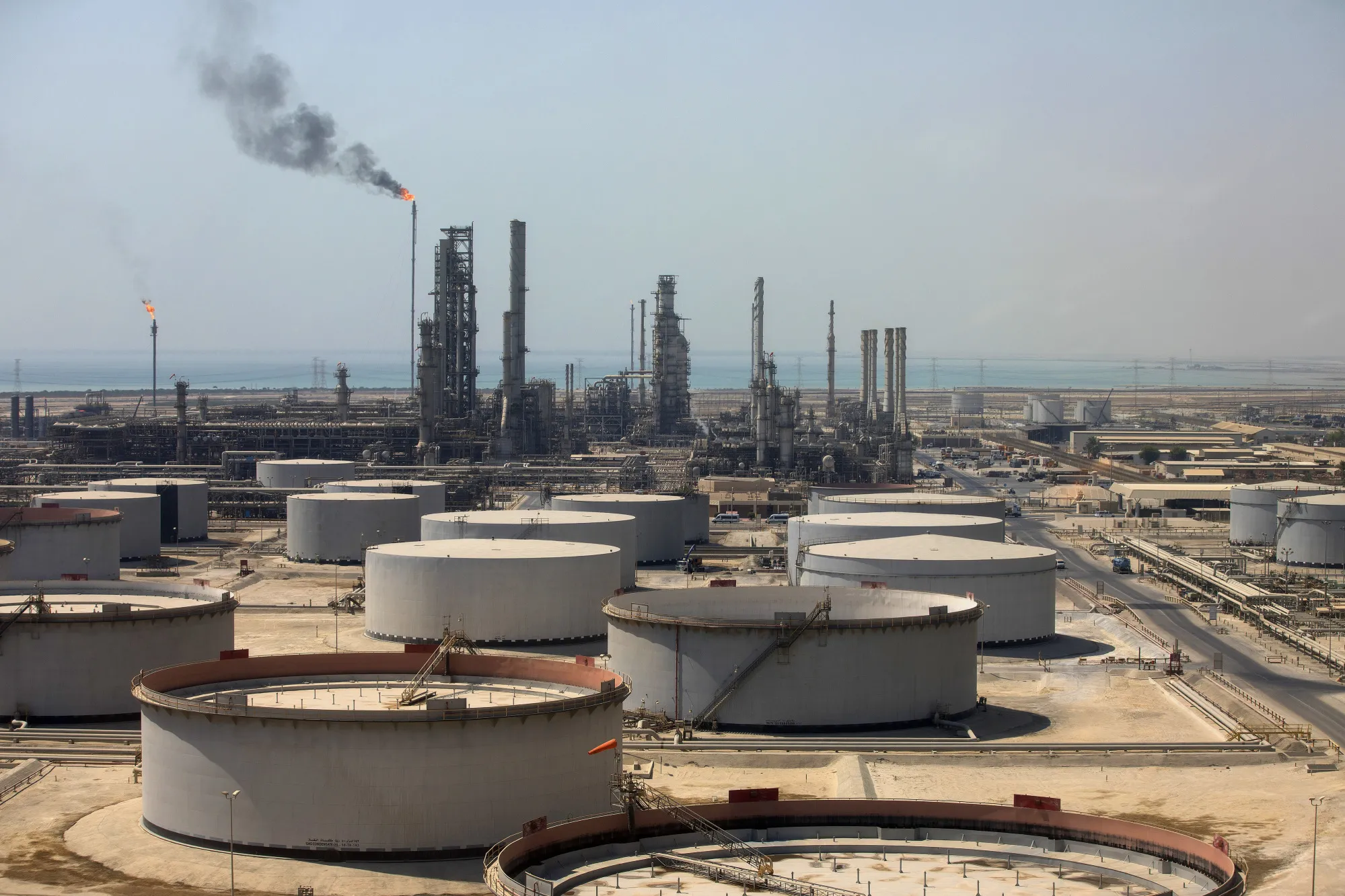 Crude oil storage tanks at an oil refinery in Ras Tanura, Saudi Arabia.