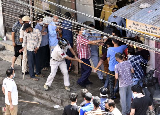India Races to Restore Order After Protests, Liquor Shop Brawls