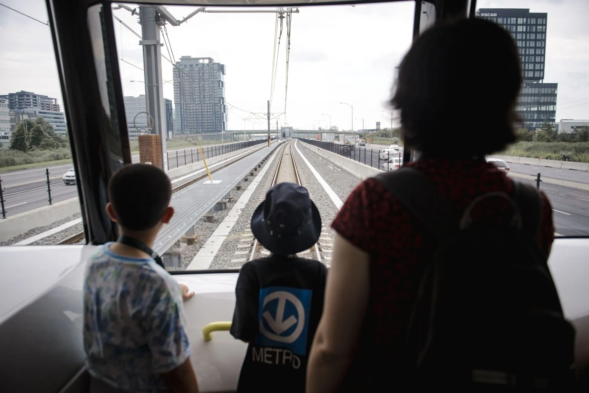 Visitors ride the Reseau Express Metropolitain (REM) light rail during its inauguration ceremony in Montreal, Quebec, Canada, on Friday, July 28, 2023.