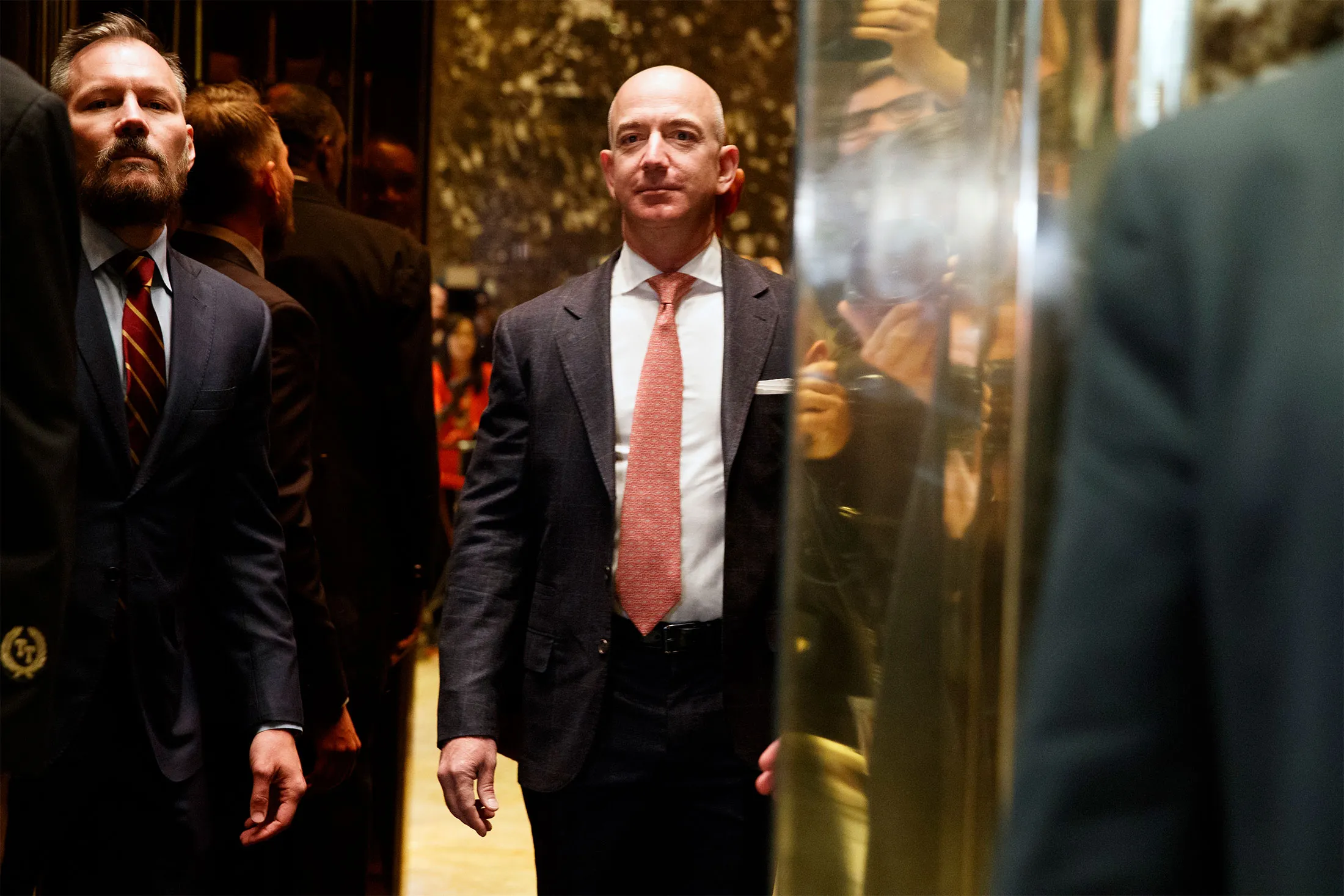 Jeff Bezos, right, at Trump Tower with&nbsp;Brian Huseman in 2016.