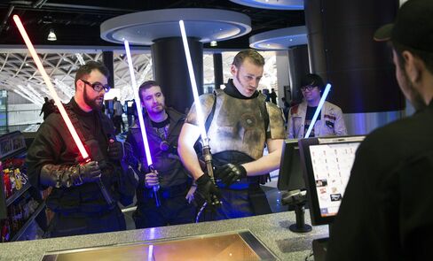 Star Wars fans collect their tickets