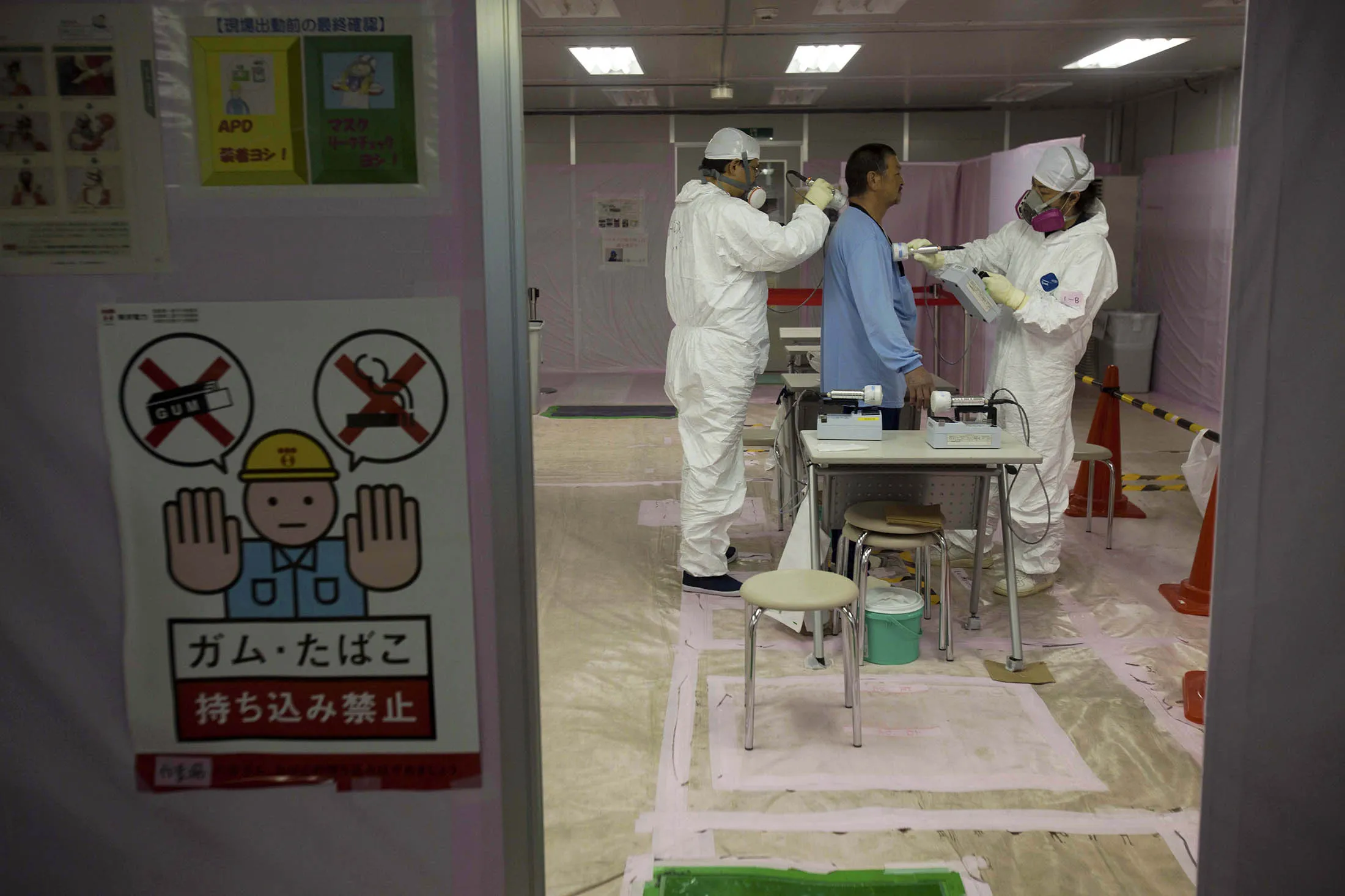 A worker is given radiation screening at the crippled Fukushima Dai-Ichi nuclear plant.
