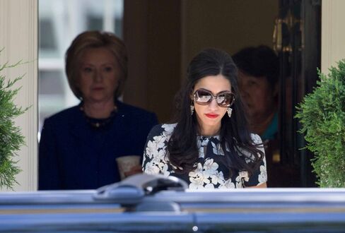 Huma Abedin and Hillary Clinton.