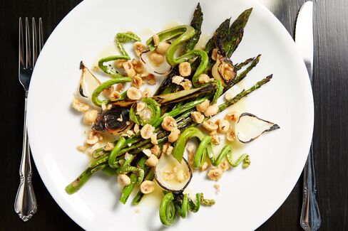 A party of asparagus and fiddlehead ferns.