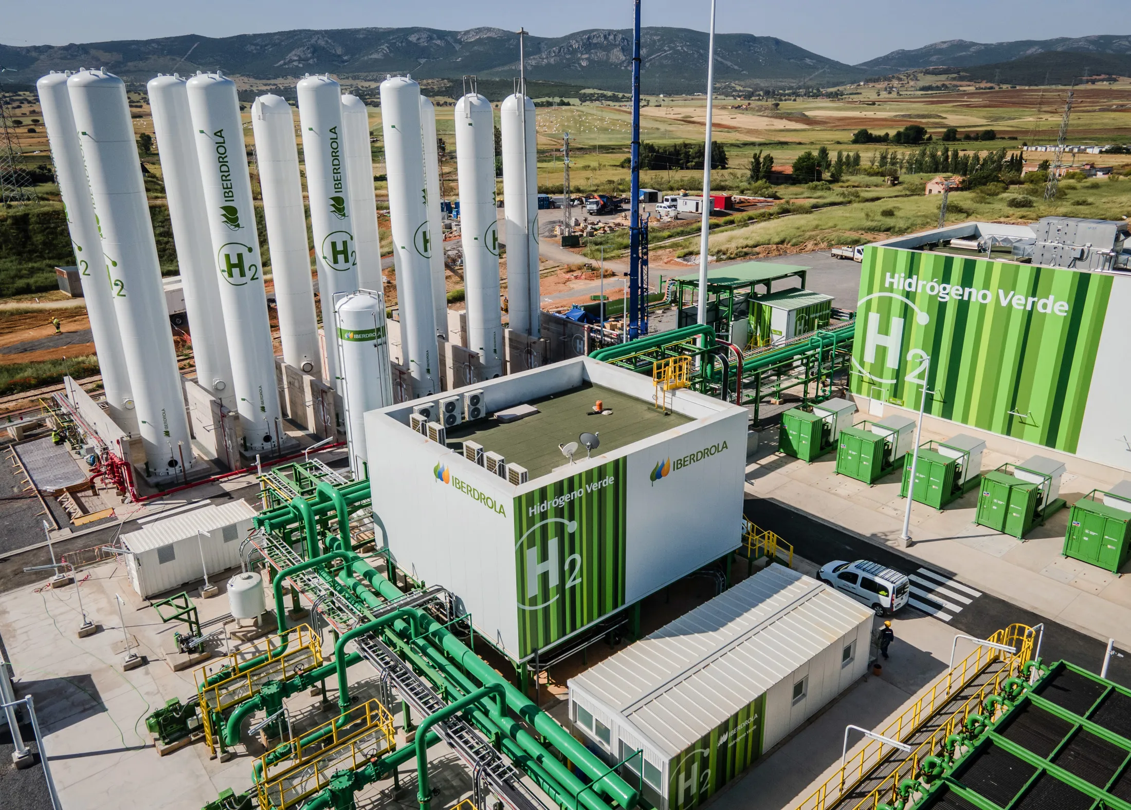 Hydrogen storage tanks, an electricity substation and an electrolyzer in the final stage of construction at a green hydrogen plant in Puertollano, Spain, in May 2022.