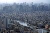 Buildings and the Sumida River are seen from the viewing deck of the Tokyo Skytree, operated by Tobu Railway Co., in Tokyo, Japan, on Friday, Dec. 25, 2020.