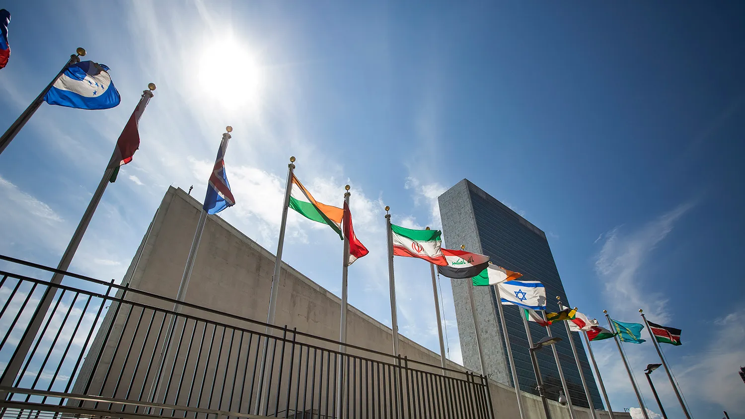 Flags fly outside the the United Nations headquarters in New York on Aug. 5, 2015.
