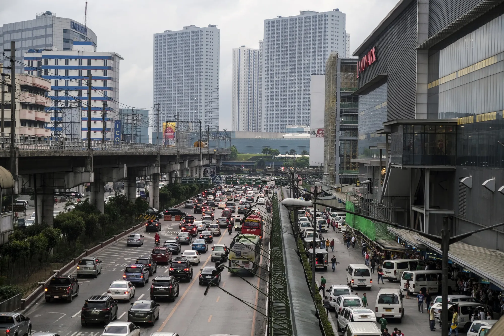 Vehicles travel along a road during rush hour in Manila in 2019.