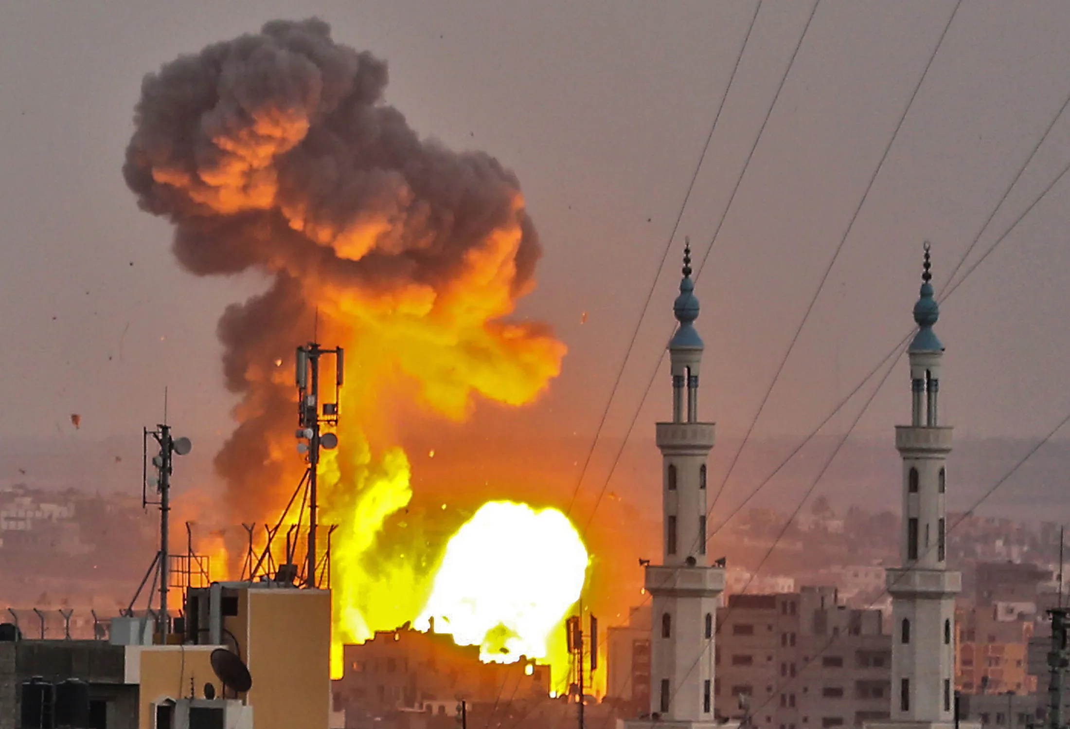 Eexplosions over Gaza City on July 20.