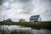 Houses along the flood zone in Dauphin Island, Ala.