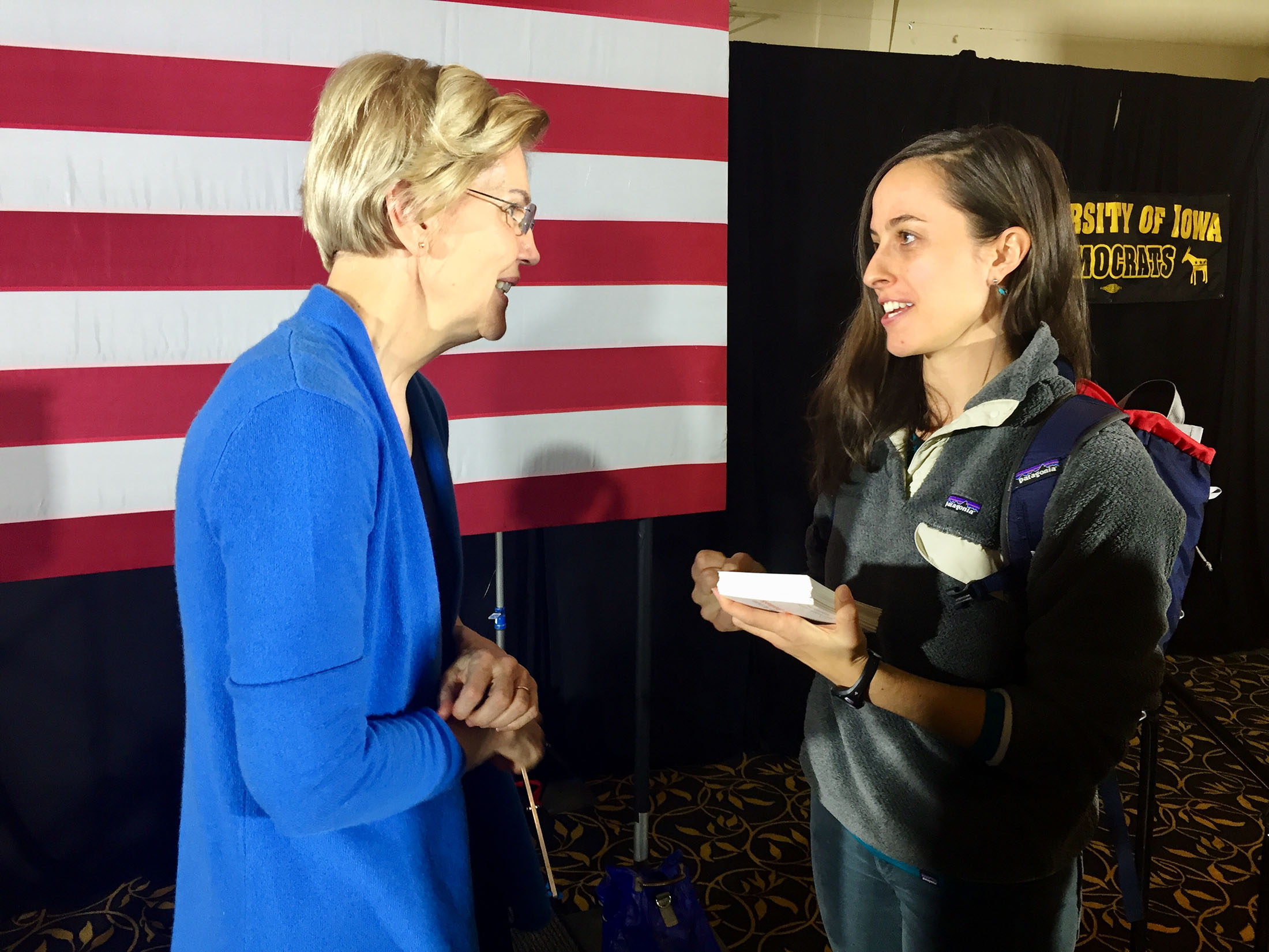 Mighty Earth activist Anya Fetcher presses Senator Elizabeth Warren on biofuel policy during an event in Iowa.