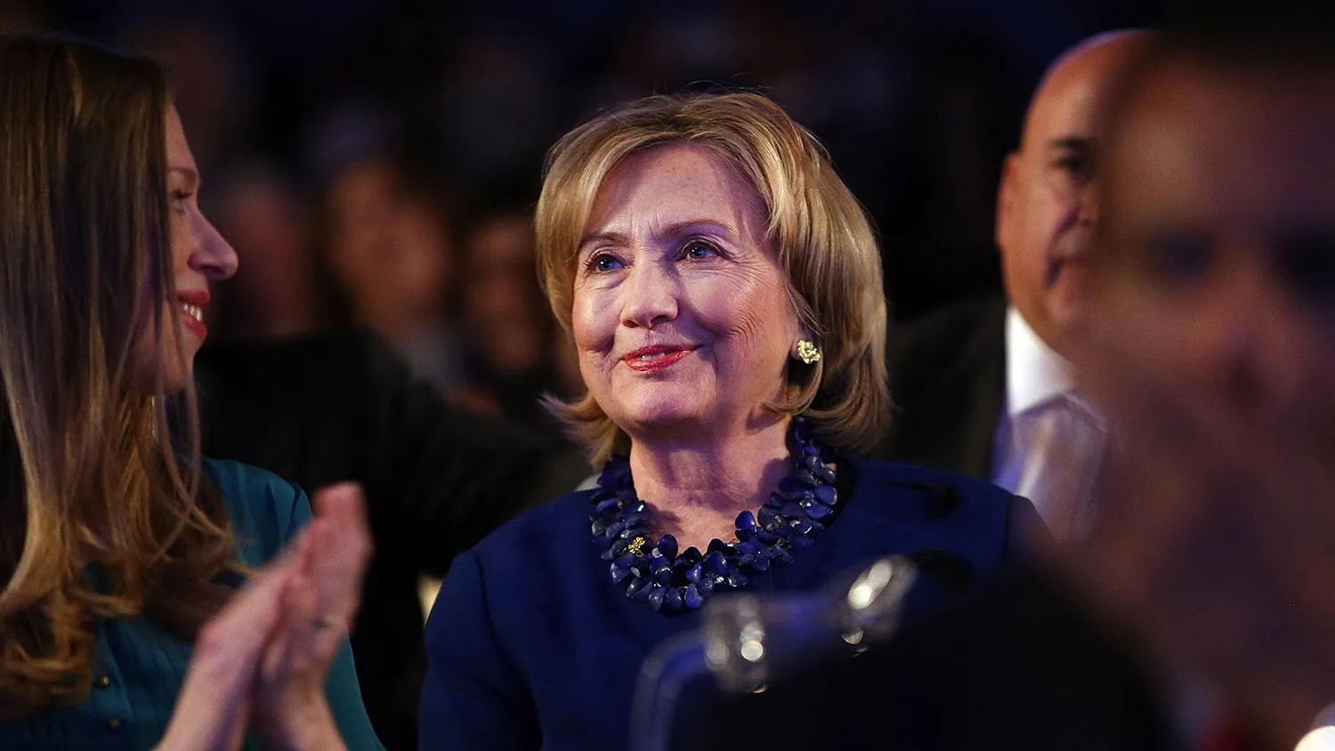 Former U.S. Secretary of State Hillary Clinton and daughter Chelsea Clinton are viewed in the audience as U.S. President Barack Obama, who is in New York City for the 69th Session of the United Nations General Assembly, speaks at the Clinton Global Initiative on September 23, 2014 in New York City.

